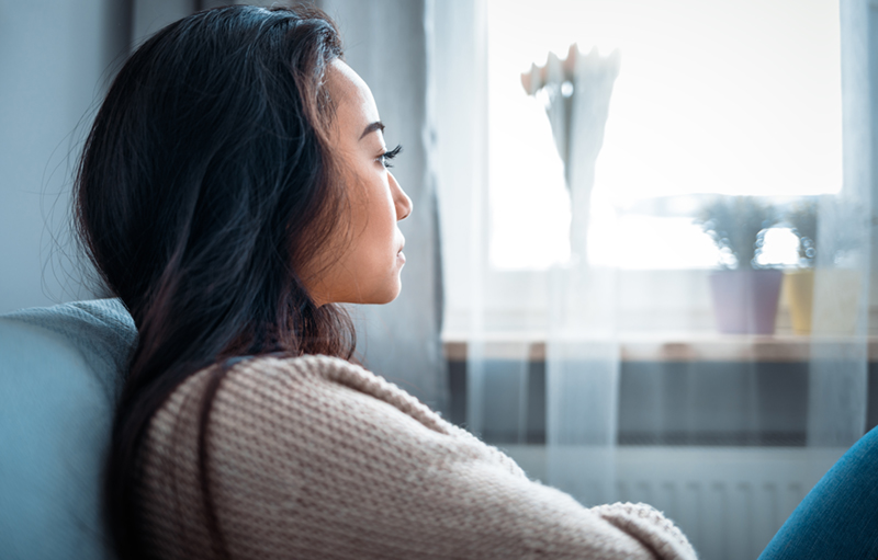young woman looking off to the side